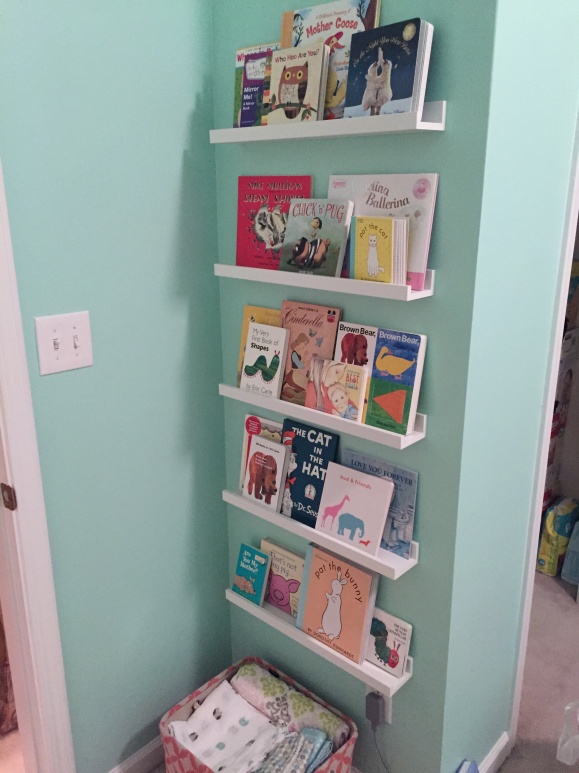 Molly's book wall!  Possibly my favorite part of the nursery.